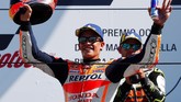 Marc Marquez tetap puas berada di podium kedua di Sirkuit Misano. Ia kokoh di posisi pertama klasemen sementara MotoGP dengan koleksi 221 poin, unggul 67 angka dari Dovizioso yang ada di posisi kedua. (REUTERS/Max Rossi)