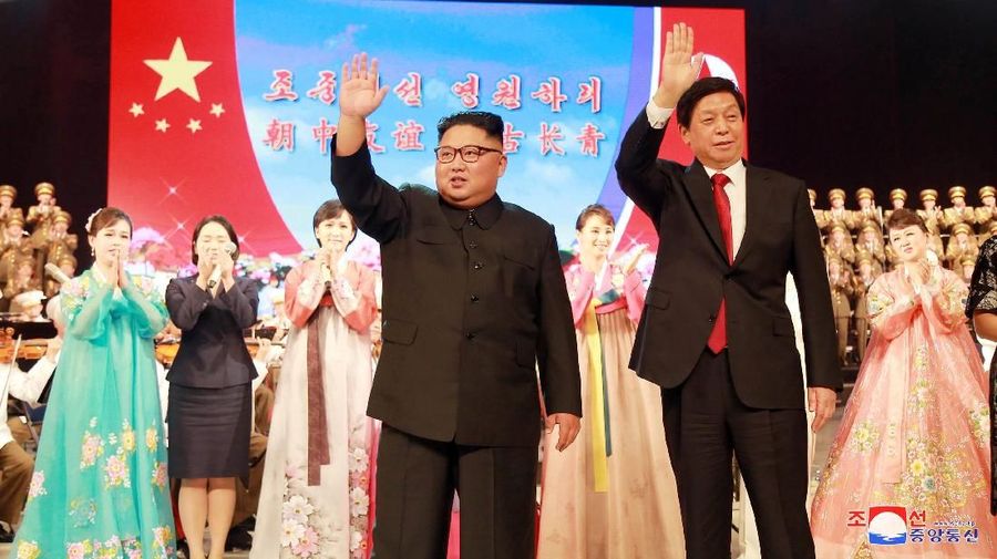 North Korean leader Kim Jong Un and China's Li Zhanshu, chairman of the Standing Committee of the National People's Congress (NPC), attend a welcoming performance in Pyongyang, North Korea, in this undated photo released September 11, 2018 by North Korea's Korean Central News Agency (KCNA). KCNA via REUTERS ATTENTION EDITORS - THIS IMAGE WAS PROVIDED BY A THIRD PARTY. REUTERS IS UNABLE TO INDEPENDENTLY VERIFY THIS IMAGE. NO THIRD PARTY SALES. SOUTH KOREA OUT.