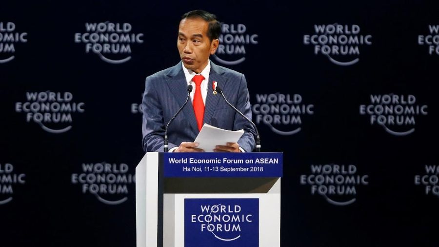 Indonesia's President Joko Widodo speaks at the plenary session of the World Economic Forum on ASEAN at the Convention Center in Hanoi, Vietnam, September 12, 2018. REUTERS/Kham