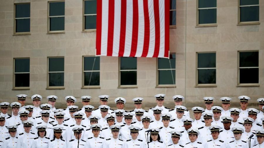 The U.S. Navy Glee Club performs during the 17th annual September 11 observance ceremony at the Pentagon in Washington, U.S., September 11, 2018. REUTERS/Joshua Roberts TPX IMAGES OF THE DAY