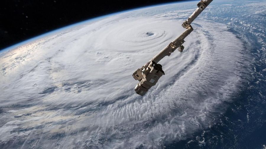 A view of Hurricane Florence is shown churning in the Atlantic Ocean in a west, north-westerly direction heading for the eastern coastline of the United States, taken by cameras outside the International Space Station, September 12, 2018. NASA/Handout via REUTERS ATTENTION EDITORS - THIS IMAGE WAS PROVIDED BY A THIRD PARTY TPX IMAGES OF THE DAY