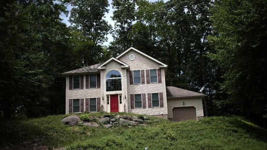 An unoccupied home is seen in the Penn Estates development where most of the homeowners are underwater on their mortgages in East Stroudsburg, Pennsylvania, U.S., June 20, 2018. Picture taken June 20, 2018. REUTERS/Mike Segar
