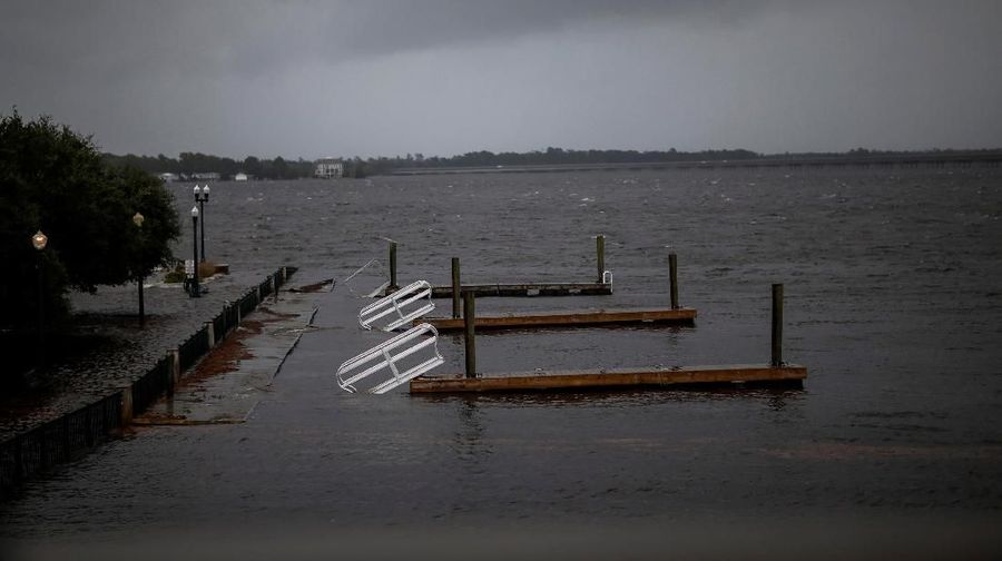 Docks broken by water from Neuse River are seen floating as Hurricane Florence comes ashore in New Bern, North Carolina, U.S., September 13, 2018. REUTERS/Eduardo Munoz