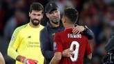 Juergen Klopp memuji Roberto Firmino yang mencetak gol penentu kemenangan Liverpool atas PSG 3-2 pada masa injury time babak kedua. (Reuters/Carl Recine)