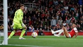Penyerang asal Gabon Pierre-Emerick Aubameyang menjadi bintang Arsenal di pertandingan ini dengan mencetak dua gol ke gawang Vorskla Poltava. (REUTERS/David Klein)