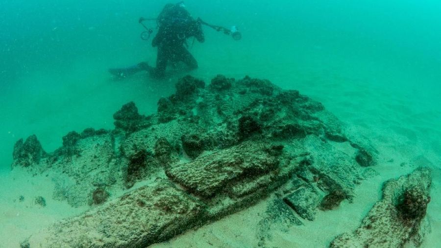 Divers are seen during the discovery of a centuries-old shipwreck, in Cascais in this handout photo released September 24, 2018. Augusto Salgado/Cascais City Hall/Handout via Reuters