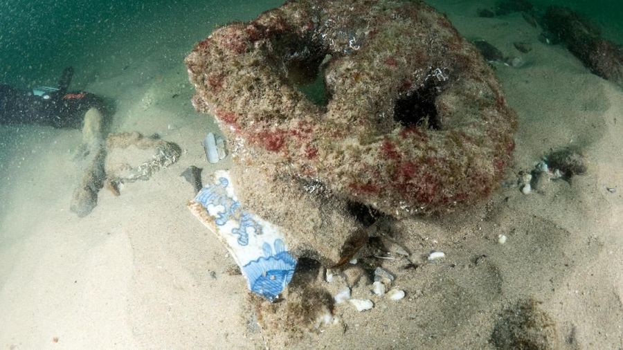 Divers are seen during the discovery of a centuries-old shipwreck, in Cascais in this handout photo released September 24, 2018. Augusto Salgado/Cascais City Hall/Handout via Reuters