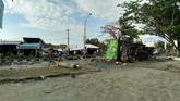 Pemerintah masih sulit memastikan jumlah korban dan bantuan yang dibutuhkan karena saluran komunikasi di Donggala terputus. (AFP PHOTO / OLA GONDRONK)