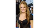 Lindsay Lohan adalah salah satu yang disebut sempat menjalani operasi plastik. Kala foto ini diambil pada 2003, Lohan dikenal sebagai remaja yang sudah cantik. (Frederick M. Brown/Getty Images/AFP)