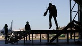 Jaket terbang ini memiliki kecepatan 32 mil per jam dengan lima mesin jet miniatur. (REUTERS/Chris Radburn)