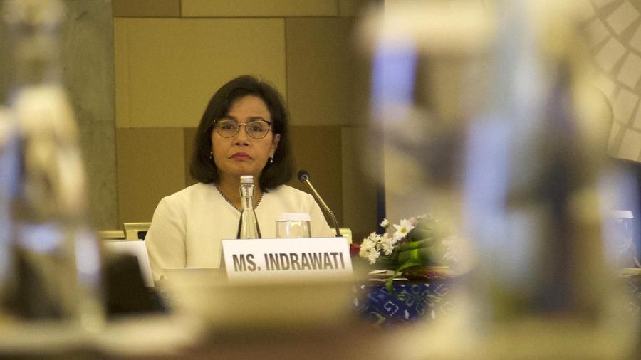 Menteri Keuangan Republik Indonesia Sri Mulyani Indrawati (tengah) menyampaikan sambutannya saat pembukaan acara 