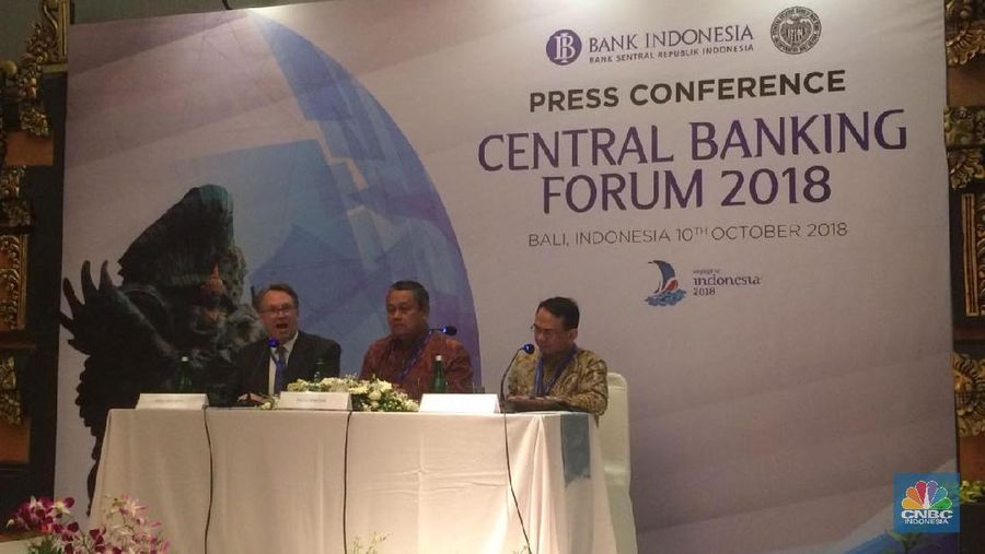 Presiden Federal Reserve New York John Williams mengatakan central banker di AS tidak melihat dampak signifikan dari memanasnya ketegangan perdagangan global.