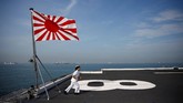 Yuma Osaki, a navigator, prepares to blow a bugle on the bridge of Japanese helicopter carrier Kaga as it departs for naval drills in the Indian Ocean, Indonesia, September 22, 2018. REUTERS/Kim Kyung-Hoon SEARCH