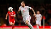 Pada laga internasional lainnya, Spanyol juga sukses meraup kemenangan telak saat melawat ke markas Wales. Tim Matador mengalahkan Wales 4-1 di Stadion Millennium. (Reuters/Andrew Couldridge)