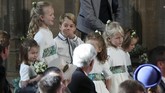 Pangeran George dan Putri Charlotte tampaknya sudah hafal betul tugas mereka sebagai pageboy dan bridesmaid. Ini kali ketiga mereka menjadi pendamping pernikahan. (Yui Mok/Pool via REUTERS)