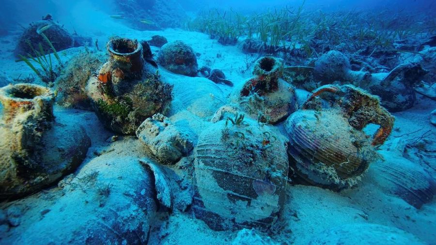 Amphorae are seen at the sea bottom at a shipwreck site on the island of Fournoi, Greece, September 15, 2018. Picture taken September 15, 2018. Vassilis Mentogiannis/Hellenic Ephorate of Underwater Antiquities/Handout via REUTERS ATTENTION EDITORS - THIS PICTURE WAS PROVIDED BY A THIRD PARTY.