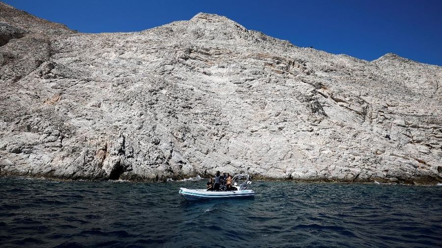 Members of the Fournoi Survey Project are seen on an inflatable boat before a dive at a shipwreck site on the island of Fournoi, Greece, September 19, 2018. Picture taken September 19, 2018. REUTERS/Alkis Konstantinidis