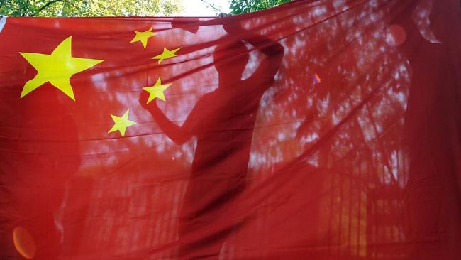 China Marah Logo Bintang di Bendera Diubah Jadi Virus Corona