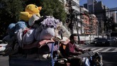 Jika dilihat secara kuartalan, ekonomi China tumbuh melambat menjadi 1,6 persen dari revisi 1,7 persen pada kuartal II, sejalan dengan ekspektasi pertumbuhan. (Nicolas ASFOURI/AFP).