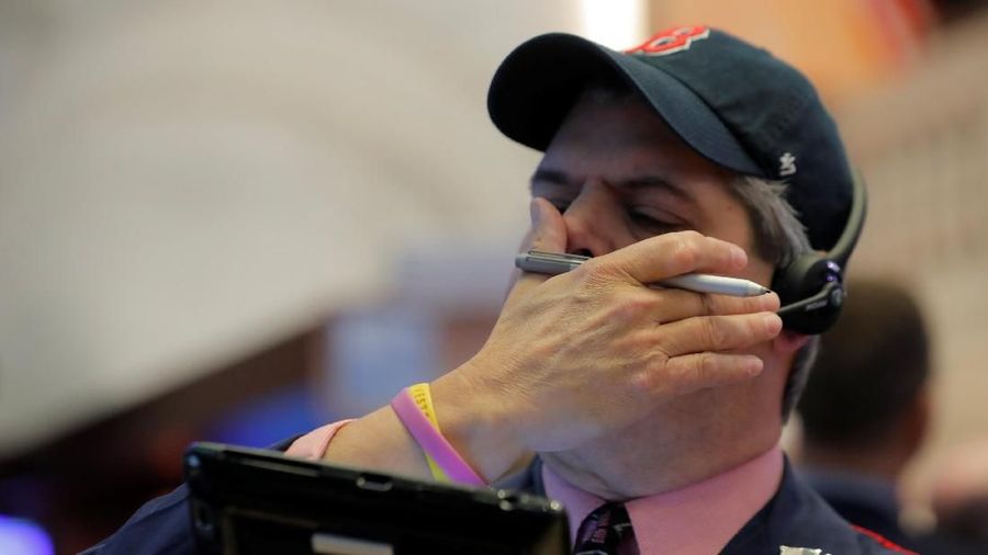 Traders work on the floor of the New York Stock Exchange (NYSE) in New York, U.S., October 19, 2018.    REUTERS/Brendan McDermid