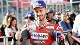 Berada di posisi start pertama membuka peluang Dovizioso mengulang keberhasilan tahun lalu ketika tampil sebagai juara MotoGP Jepang. Selain itu Dovi juga berpeluang menunda pesta juara Marquez. (REUTERS/Toru Hanai)