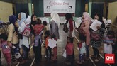 Acara yang mayoritas dihadiri emak-emak itu diisi dengan menimbang dan mengukur anaknya. Penyuluhan dan pemeriksaan gizi balita juga digelar. (CNN Indonesia/Adhi Wicaksono)
