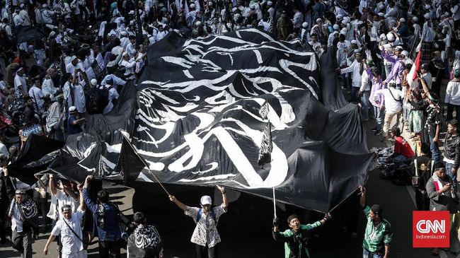 Setengah Hati Jokowi Redam Isu Pembakaran Bendera