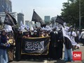 Massa Bawa Spanduk 'Bubarkan Banser' di Aksi Bela Tauhid