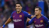 Philippe Coutinhyo membuka keunggulan Barcelona di menit ke-11. Coutinho memaksimalkan umpan silang yang dilepaskan oleh Jordi Alba. (Photo by GABRIEL BOUYS / AFP)
