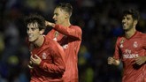 Alvaro Odriozola (kiri) turut menyumbangkan gol dalam kemenangan 4-0 Madrid atas Melilla. Kemenangan besar turut memperbesar peluang Los Blancos melaju ke babak 16 besar Copa del Rey. (JORGE GUERRERO / AFP)