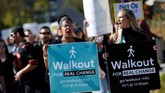 Aksi bernama Walkout for Real Change ini diharapkan dapat mengubah transparansi perusahaan terhadap kasus pelecehan. (REUTERS/Stephen Lam)