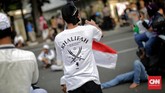 Setelah bertemu Menkopolhukam Wiranto, massa membubarkan aksi dengan tertib. (CNN Indonesia/Adhi Wicaksono)