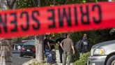 Sebuah bar di California berubah bak neraka ketika seorang veteran Marinir Amerika Serikat tiba-tiba masuk dan melepaskan tembakan membabi buta hingga menewaskan 12 orang pada Rabu (7/11). (AFP Photo/Apu Gomes)