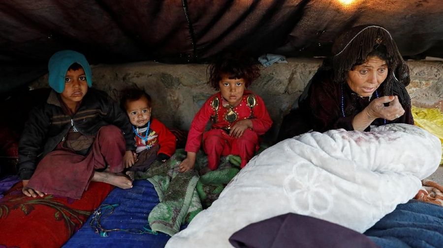 Internally displaced Afghan children study inside a tent at a refugee camp in Herat province, Afghanistan October 14, 2018. Picture taken October 14, 2018. REUTERS/Mohammad Ismail