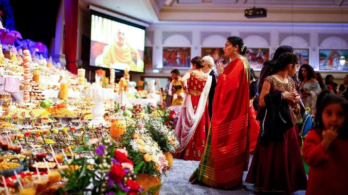 Wellwishers visit a food laden shrine as Hindus and Sadhus celebrate Diwali and Annakut at the BAPS Shri Swaminarayan Mandir in Neasden, London, Britain November 8, 2018. REUTERS/Henry Nicholls