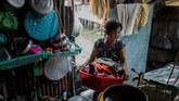 Sebagian warga sebenarnya masih enggan untuk berpindah, tapi sadar ada kepentingan bisnis yang besar yang meminta mereka untuk angkat kaki. (AFP/Nguyen)