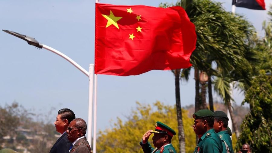 China's President Xi Jinping, Papua New Guinea's Governor-General Bob Dadae and Papua New Guinea's Chief of Defence Major General Gilbert Toropo during a welcome ceremony for Xi's state visit ahead of the APEC Summit, at Parliament House in Port Moresby, Papua New Guinea November 16, 2018. REUTERS/David Gray/Pool