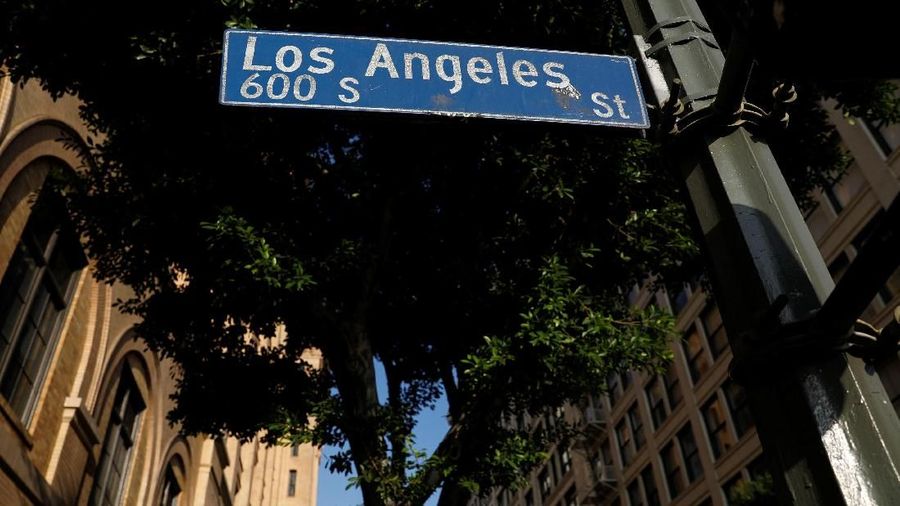 A street sign for Los Angeles street is shown in downtown Los Angeles, California, U.S., October 24, 2018.      REUTERS/Mike Blake