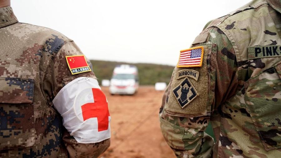 U.S. Army and China's People's Liberation Army (PLA) military personnel attend a closing ceremony of an exercise of 