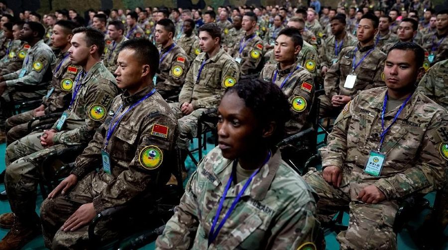 U.S. Army and China's People's Liberation Army (PLA) military personnel attend a closing ceremony of an exercise of