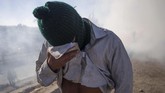 Kini, nasib para imigran semakin terkatung-katung. Enggan tinggal di Meksiko, tapi tak diperbolehkan masuk ke AS. (Reuters/Adrees Latif)