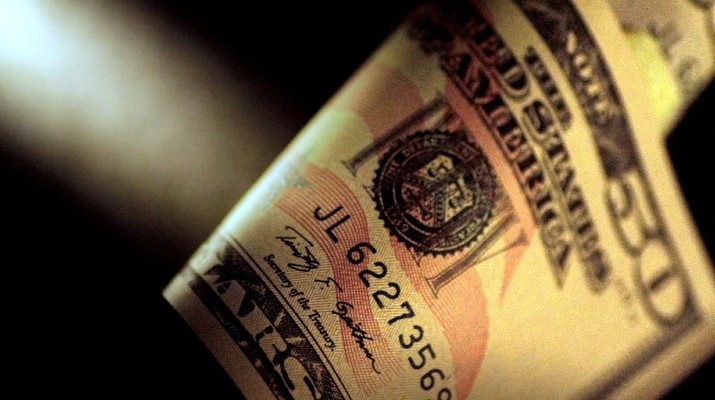 Foto Ilustrasi mata uang Dolar. REUTERS/Thomas White/Illustration/File Photo FILE PHOTO: A U.S. Dollar note is seen in this June 22, 2017 illustration photo. REUTERS/Thomas White/Illustration/File Photo/File Photo