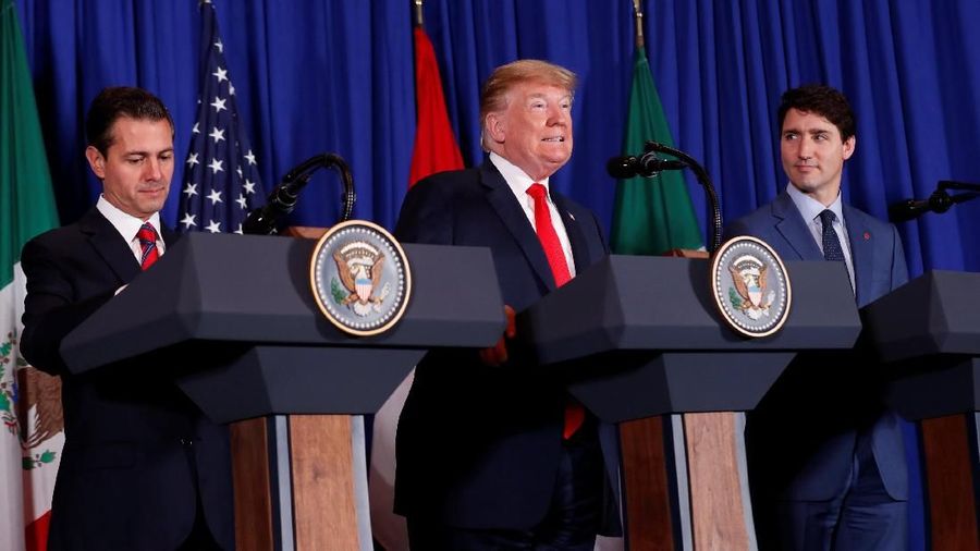 U.S. President Donald Trump, Canada's Prime Minister Justin Trudeau and Mexico's President Enrique Pena Nieto attend the USMCA signing ceremony before the G20 leaders summit in Buenos Aires, Argentina November 30, 2018. REUTERS/Kevin Lamarque