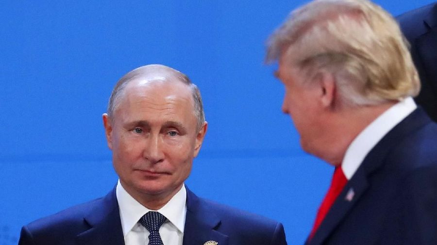 U.S. President Donald Trump and Russia's President Vladimir Putin are seen during the G20 leaders summit in Buenos Aires, Argentina November 30, 2018. REUTERS/Marcos Brindicci     TPX IMAGES OF THE DAY