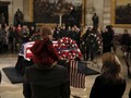 Washington Mengesampingkan Ego dalam Pemakaman Bush