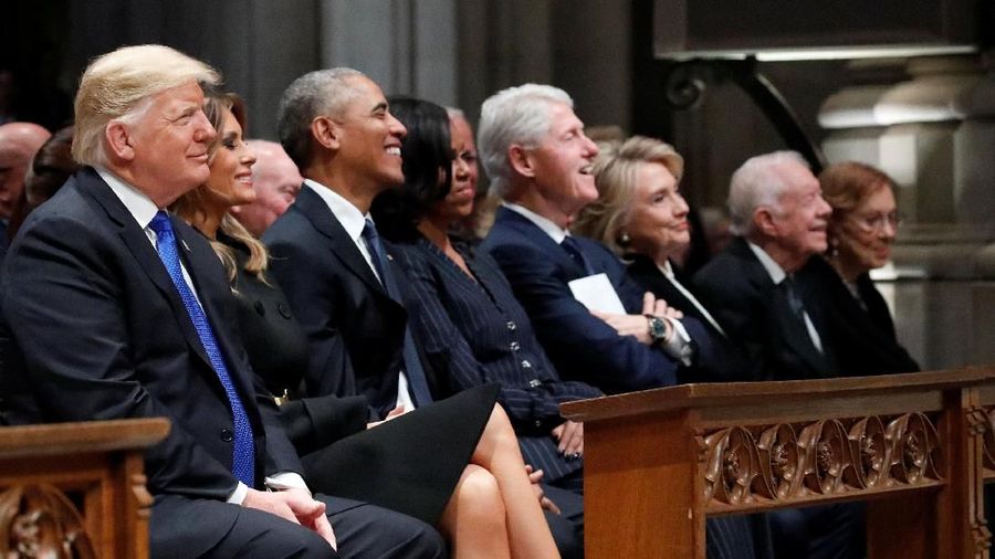 U.S. President Donald Trump, first lady Melania Trump, former President Barack Obama, former first lady Michelle Obama, former President Bill Clinton, former Secretary of State Hillary Clinton, former President Jimmy Carter and former first lady Rosalynn Carter participate in the State Funeral for former President George H.W. Bush, at the National Cathedral, Wednesday, Dec. 5, 2018 in Washington. Alex Brandon/Pool via REUTERS
