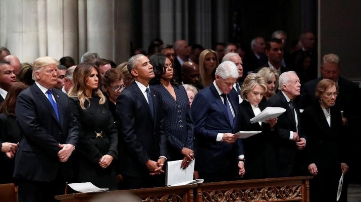 U.S. President Donald Trump, first lady Melania Trump, former President Barack Obama, former first lady Michelle Obama, former President Bill Clinton, former Secretary of State Hillary Clinton, former President Jimmy Carter and former first lady Rosalynn Carter participate in the State Funeral for former President George H.W. Bush, at the National Cathedral, Wednesday, Dec. 5, 2018 in Washington. Alex Brandon/Pool via REUTERS