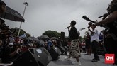 Para peserta aksi berpendapat, lambatnya pengesahan RUU PK-S ini menunjukkan DPR dan pemerintah tak berani bersuara terhadap kasus kekerasan seksual. (CNNIndonesia/Adhi Wicaksono)