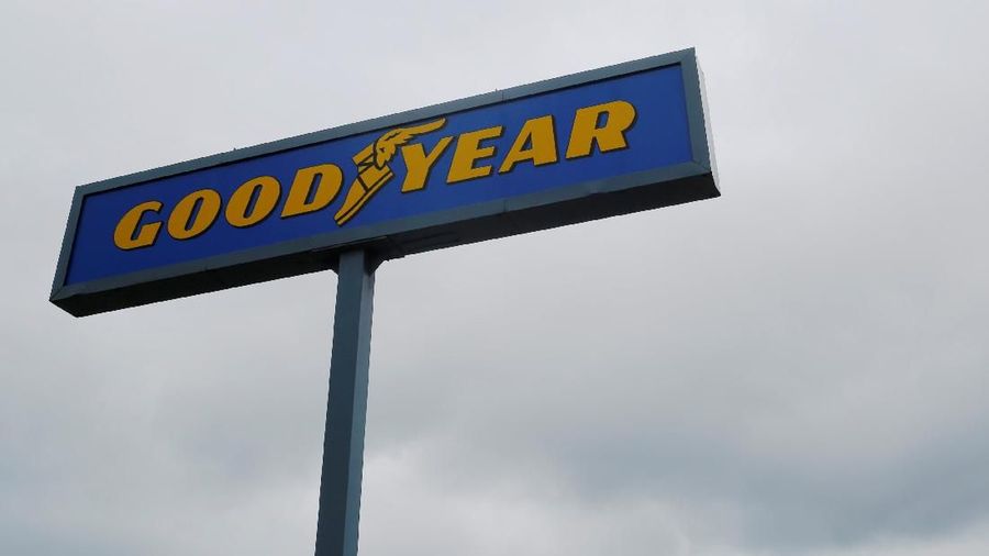 FILE PHOTO: A sign stands over a Goodyear Tire facility in Somerville, Massachusetts, U.S., July 25, 2017.   REUTERS/Brian Snyder/File Photo