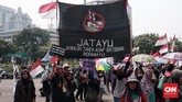 Dalam aksinya massa yang bergabung bersama Walhi menuntut keadilan kepada Pemerintah yang hanya mempercepat proses pembangunan infrastruktur namun melupakan pengelolaan lingkungan dan manusianya. (CNN Indonesia/Andry Novelino)